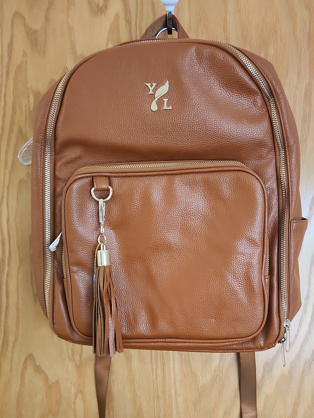 Young Living Tan Faux Leather Backpack with Tassel